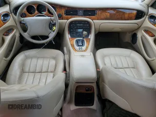 1999 Jaguar XJ with VIN SAJHX1040XC864208, listed as a Copart auction lot 59748585 with 130,577 mi miles and Clean title. Bid and sale history available at DreamBid. Image 8.