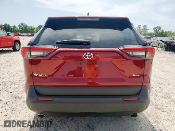 2022 Toyota RAV4 XLE Premium with VIN 2T3C1RFV7NW234284, listed as a Copart auction lot 57142325 with 21,580 mi miles and Salvage title. Bid and sale history available at DreamBid. Image 6.