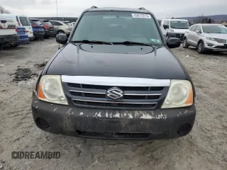 2004 Suzuki XL7 LX z VIN JS3TX92V344110661, wystawiony jako Copart lot #43613315 z przebiegiem 143 334 mil mil oraz Szkoda całkowita • Salvage title. Historia ofert i sprzedaży dostępna na DreamBid. Obrazek 5.
