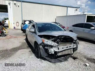 2016 Ford Focus SE z VIN 1FADP3F24GL309119, wystawiony jako Copart lot #62279095 z przebiegiem 117 535 mil mil oraz Szkoda całkowita • Salvage title. Historia ofert i sprzedaży dostępna na DreamBid. Obrazek 14.