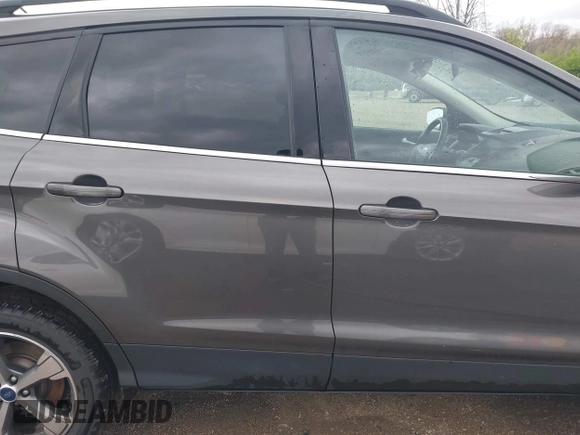 2017 Ford Escape SE with VIN 1FMCU9GD4HUE45193, listed as a IAAI auction lot 42055861 with 154,961 mi miles and . Bid and sale history available at DreamBid. Image 13.