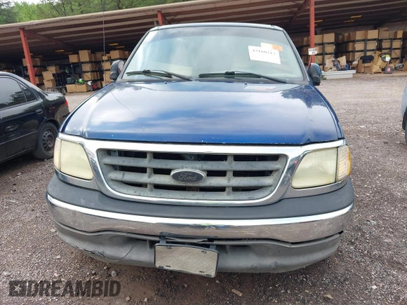 2002 Ford F-150 XL with VIN 1FTRX17W12NC06310, listed as a IAAI auction lot 42160213 with Not provided miles and . Bid and sale history available at DreamBid. Image 6.