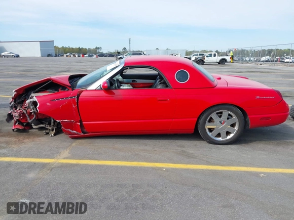 2002 Ford Thunderbird Hardtop Premium with VIN 1FAHP60A02Y130882, listed as a IAAI auction lot 41911737 with 18,521 mi miles and . Bid and sale history available at DreamBid. Image 15.