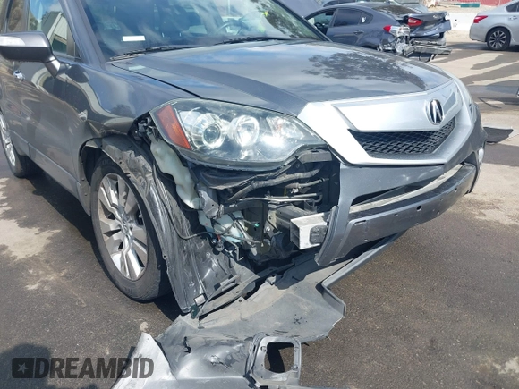 2012 Acura RDX Tech Pkg with VIN 5J8TB2H58CA002131, listed as a IAAI auction lot 41880892 with 140,115 mi miles. Bid and sale history available at carsss.com. Image 6.