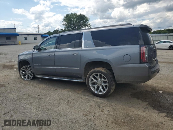 2019 GMC Yukon XL SLT z VIN 1GKS1GKC0KR325305, wystawiony jako Copart lot #56219325 z przebiegiem 136 295 mil mil oraz Szkoda całkowita • Salvage title. Historia ofert i sprzedaży dostępna na DreamBid. Obrazek 2.