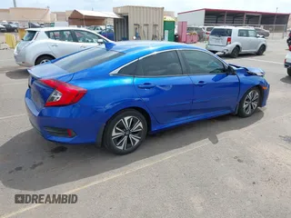 2018 Honda Civic EX-T z VIN JHMFC1F31JX018152, wystawiony jako IAAI lot #41935394 z przebiegiem 60 333 mil mil oraz . Historia ofert i sprzedaży dostępna na DreamBid. Obrazek 4.