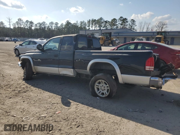 2001 Dodge Dakota SLT with VIN 1B7GG22X41S309217, listed as a Copart auction lot 44257285 with 153,872 mi miles and Salvage Title. Bid and sale history available at carsss.com. Image 2.