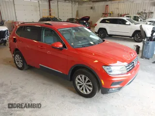 2018 Volkswagen Tiguan SEL z VIN 3VV2B7AX2JM001254, wystawiony jako IAAI lot #42673513 z przebiegiem 75 627 mil mil oraz . Historia ofert i sprzedaży dostępna na DreamBid. Obrazek 1.