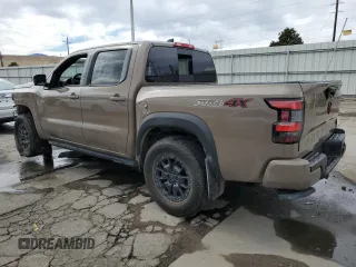 2023 Nissan Frontier Pro-4X with VIN 1N6ED1EK5PN641391, listed as a Copart auction lot 46895485 with 17,465 mi miles and Salvage title. Bid and sale history available at DreamBid. Image 2.