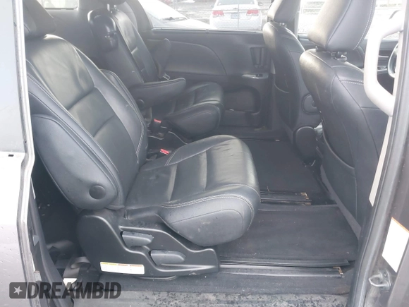 2015 Toyota Sienna SE with VIN 5TDXK3DC2FS540681, listed as a IAAI auction lot 41192481 with 108,782 mi miles and . Bid and sale history available at DreamBid. Image 8.