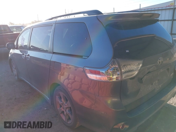 2014 Toyota Sienna SE with VIN 5TDXK3DC1ES462473, listed as a IAAI auction lot 41811437 with 209,704 mi miles and . Bid and sale history available at DreamBid. Image 3.