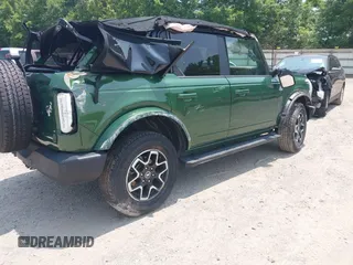 2024 Ford Bronco Outer Banks z VIN 1FMEE8BPXRLA06492, wystawiony jako IAAI lot #42365356 z przebiegiem 17 565 mil mil oraz . Historia ofert i sprzedaży dostępna na DreamBid. Obrazek 4.