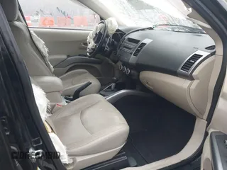 2007 Mitsubishi Outlander XLS z VIN JA4MT41X97Z018573, wystawiony jako IAAI lot #41937728 z przebiegiem 151 346 mil mil oraz . Historia ofert i sprzedaży dostępna na DreamBid. Obrazek 5.