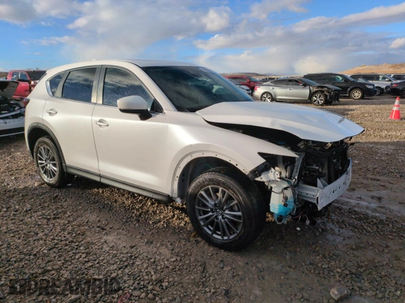 2021 Mazda CX-5 Touring with VIN JM3KFBCM0M0355894, listed as a Copart auction lot 83593464 with 80,703 mi miles and Salvage Title. Bid and sale history available at carsss.com. Image 4.