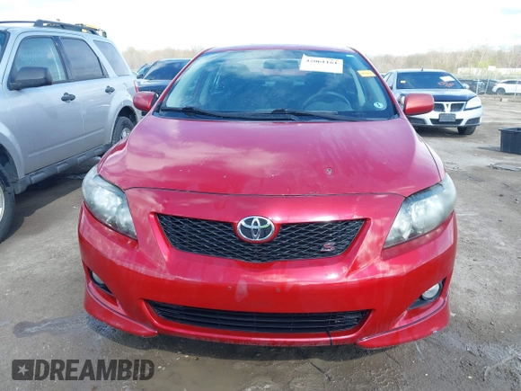 2009 Toyota Corolla with VIN 1NXBU40E19Z003510, listed as a IAAI auction lot 42061161 with 136,846 mi miles. Bid and sale history available at carsss.com. Image 12.