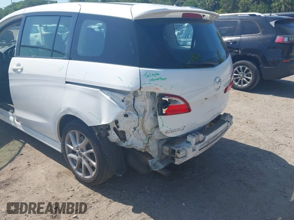 2013 Mazda 5 Touring with VIN JM1CW2CL8D0153437, listed as a IAAI auction lot 42181891 with 118,610 mi miles and . Bid and sale history available at DreamBid. Image 6.