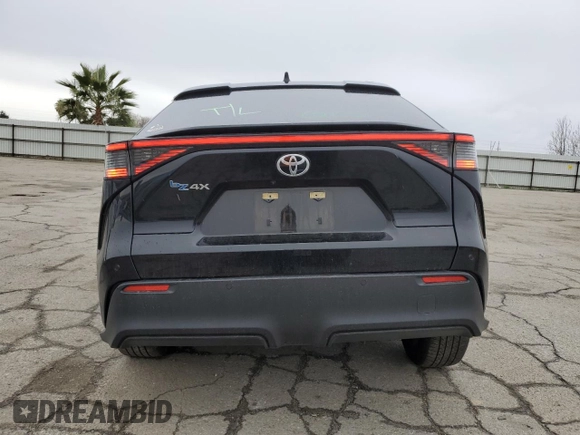 2023 Toyota bZ4X XLE with VIN JTMAAAAA7PA026565, listed as a Copart auction lot 44825145 with 17,890 mi miles and Salvage Title. Bid and sale history available at DreamBid. Image 6.