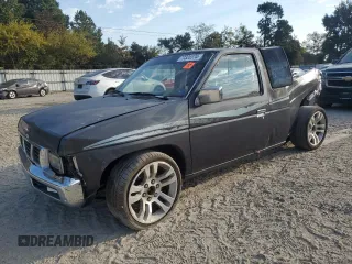 1996 Nissan Frontier XE z VIN 1N6SD16S4TC308641, wystawiony jako Copart lot #77328574 z przebiegiem Nie podano mil oraz Szkoda całkowita • Salvage title. Historia ofert i sprzedaży dostępna na DreamBid. Obrazek 1.