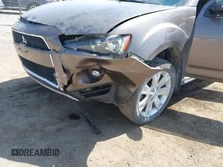 2011 Mitsubishi Outlander SE with VIN JA4AS3AW0BU032083, listed as a IAAI auction lot 42257699 with 160,038 mi miles and . Bid and sale history available at DreamBid. Image 6.