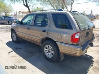 2002 Isuzu Rodeo S z VIN 4S2CK58W024305673, wystawiony jako IAAI lot #42205119 z przebiegiem Nie podano mil oraz . Historia ofert i sprzedaży dostępna na DreamBid. Obrazek 3.