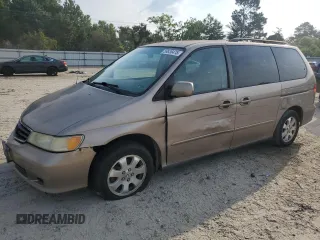 2004 Honda Odyssey EX-RES with VIN 5FNRL18814B090247, listed as a Copart auction lot 59836475 with 218,231 mi miles and Clean title. Bid and sale history available at DreamBid. Image 1.
