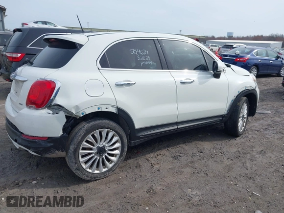 2016 FIAT 500X Lounge z VIN ZFBCFYDT0GP328541, wystawiony jako IAAI lot #42016388 z przebiegiem 134 806 mil mil oraz . Historia ofert i sprzedaży dostępna na DreamBid. Obrazek 13.