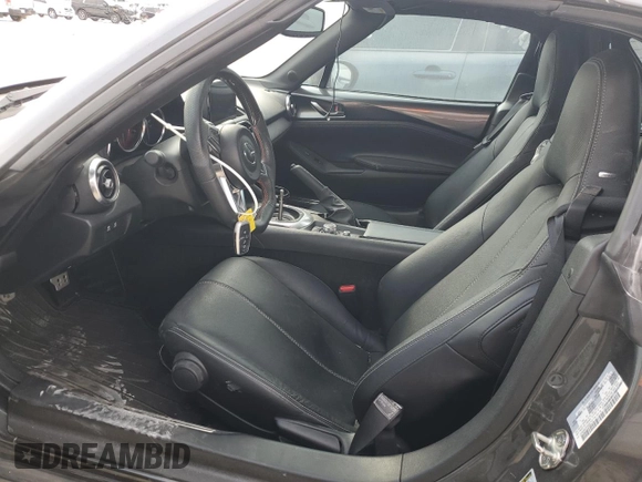2023 Mazda MX-5 Miata Grand Touring z VIN JM1NDAM70P0550719, wystawiony jako Copart lot #75485484 z przebiegiem 21 110 mil mil oraz Szkoda całkowita • Salvage title. Historia ofert i sprzedaży dostępna na DreamBid. Obrazek 7.