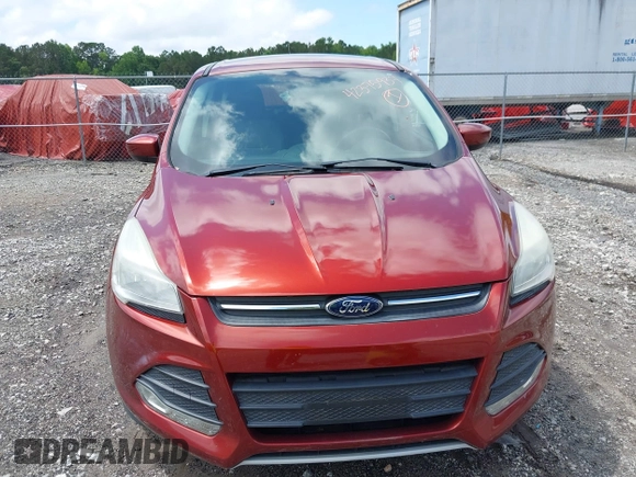 2014 Ford Escape SE z VIN 1FMCU9GX8EUC56018, wystawiony jako IAAI lot #42375937 z przebiegiem 117 341 mil mil oraz . Historia ofert i sprzedaży dostępna na DreamBid. Obrazek 6.