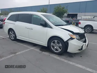 2012 Honda Odyssey Touring с VIN 5FNRL5H9XCB034435, выставлен на аукционе IAAI как лот 42162412 с пробегом 177 253 миль миль и . История ставок и продаж доступна на DreamBid. Изображение 1.