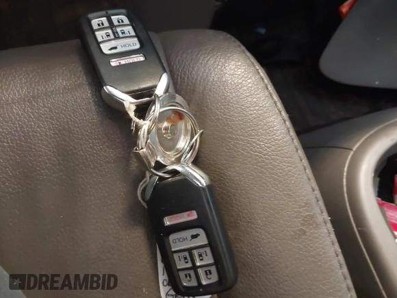 2014 Honda Odyssey Touring with VIN 5FNRL5H99EB105059, listed as a IAAI auction lot 42457672 with 240,581 mi miles and . Bid and sale history available at DreamBid. Image 11.