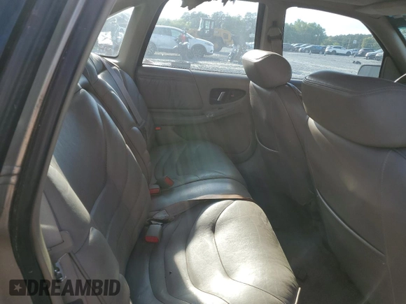 1996 Buick Regal с VIN 2G4WF52KXT1403234, выставлен на аукционе Copart как лот 52086495 с пробегом 203 388 миль миль и Списание • Salvage title. История ставок и продаж доступна на DreamBid. Изображение 10.