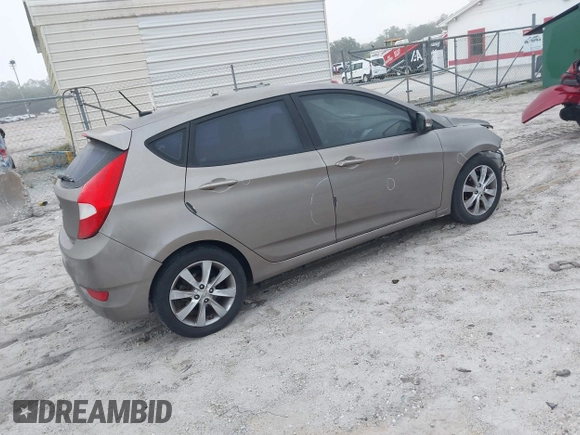 2014 Hyundai Accent SE with VIN KMHCU5AE0EU169214, listed as a IAAI auction lot 41925749 with 119,544 mi miles. Bid and sale history available at carsss.com. Image 4.