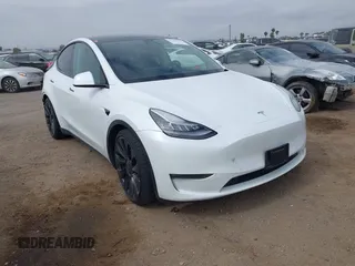 2020 Tesla Model Y Long Range z VIN 5YJYGDEF0LF056397, wystawiony jako IAAI lot #42350168 z przebiegiem 57 674 mil mil oraz . Historia ofert i sprzedaży dostępna na DreamBid. Obrazek 1.