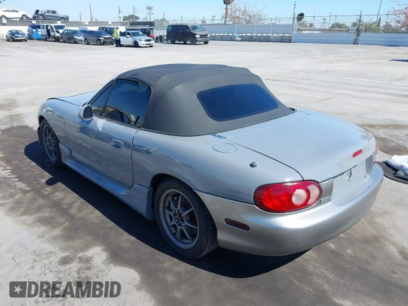 2003 Mazda MX-5 Miata Cloth with VIN JM1NB353930309670, listed as a IAAI auction lot 42234586 with 220,979 mi miles and . Bid and sale history available at DreamBid. Image 3.