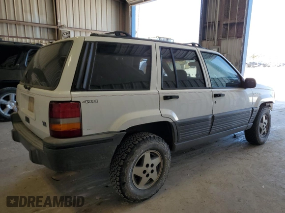 1995 Jeep Grand Cherokee Laredo with VIN 1J4GZ58Y0SC572757, listed as a Copart auction lot 52733375 with 160,588 mi miles and Salvage Title. Bid and sale history available at carsss.com. Image 3.