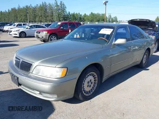 2001 Infiniti Q45 Touring z VIN JNKBY31A41M100704, wystawiony jako IAAI lot #42346520 z przebiegiem 73 073 mil mil oraz . Historia ofert i sprzedaży dostępna na DreamBid. Obrazek 2.