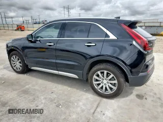 2020 Cadillac XT4 FWD Premium Luxury with VIN 1GYFZCR40LF073517, listed as a Copart auction lot 60121635 with 79,450 mi miles and Salvage title. Bid and sale history available at DreamBid. Image 2.