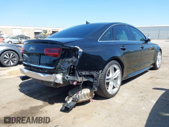 2016 Audi S6 Prestige z VIN WAUH2AFC6GN130251, wystawiony jako IAAI lot #41912382 z przebiegiem 72 512 mil mil oraz . Historia ofert i sprzedaży dostępna na DreamBid. Obrazek 4.