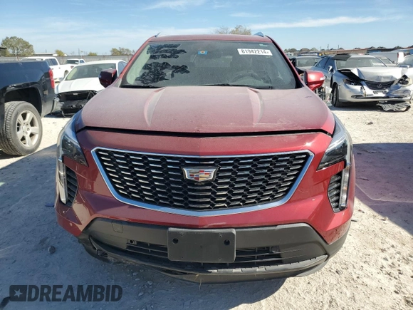2022 Cadillac XT4 FWD Premium Luxury with VIN 1GYFZCR43NF154997, listed as a Copart auction lot 81942214 with 22,697 mi miles and Salvage title. Bid and sale history available at DreamBid. Image 5.