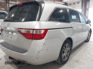 2012 Honda Odyssey EX z VIN 5FNRL5H47CB045705, wystawiony jako IAAI lot #42384430 z przebiegiem 157 598 mil mil oraz . Historia ofert i sprzedaży dostępna na DreamBid. Obrazek 20.