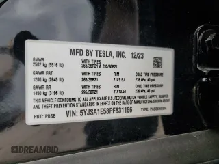 2023 Tesla Model S z VIN 5YJSA1E58PF531166, wystawiony jako Copart lot #51827565 z przebiegiem Nie podano mil oraz Szkoda całkowita • Salvage title. Historia ofert i sprzedaży dostępna na DreamBid. Obrazek 14.