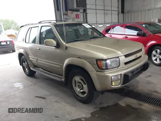 1999 Infiniti QX4 z VIN JNRAR05Y1XW049630, wystawiony jako IAAI lot #42296808 z przebiegiem 247 654 mil mil oraz . Historia ofert i sprzedaży dostępna na DreamBid. Obrazek 1.