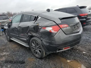 2010 Acura ZDX Tech Pkg with VIN 2HNYB1H47AH502067, listed as a Copart auction lot 82005414 with 105,274 mi miles and Salvage Title. Bid and sale history available at carsss.com. Image 2.