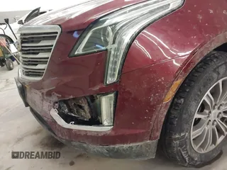 2017 Cadillac XT5 Luxury AWD with VIN 1GYKNDRS4HZ257413, listed as a IAAI auction lot 41537197 with 124,184 mi miles and . Bid and sale history available at DreamBid. Image 6.