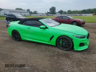 2020 BMW 8 Series z VIN WBAFY4C03LCE17539, wystawiony jako Copart lot #64737445 z przebiegiem 24 919 mil mil oraz Szkoda całkowita • Salvage title. Historia ofert i sprzedaży dostępna na DreamBid. Obrazek 4.