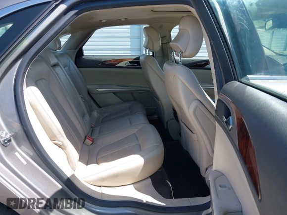 2016 Lincoln MKZ Hybrid with VIN 3LN6L2LU8GR613310, listed as a IAAI auction lot 41986892 with 114,087 mi miles. Bid and sale history available at carsss.com. Image 8.