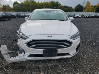 2020 Ford Fusion Hybrid SEL with VIN 3FA6P0MU8LR189560, listed as a Copart auction lot 76598364 with 57,443 mi miles and Salvage Title. Bid and sale history available at carsss.com. Image 5.