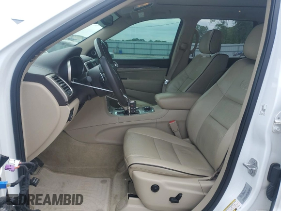 2017 Jeep Grand Cherokee Overland with VIN 1C4RJFCT7HC734125, listed as a Copart auction lot 54333215 with 101,229 mi miles and Salvage title. Bid and sale history available at DreamBid. Image 7.
