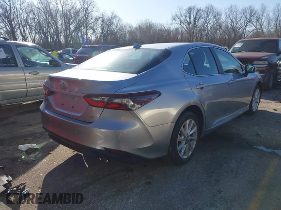 2023 Toyota Camry LE z VIN 4T1C11AK1PU771615, wystawiony jako IAAI lot #41679085 z przebiegiem 20 230 mil mil oraz . Historia ofert i sprzedaży dostępna na DreamBid. Obrazek 4.