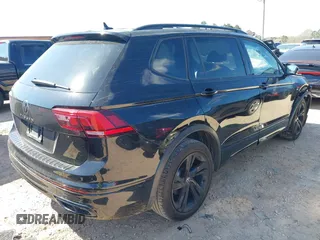2023 Volkswagen Tiguan SE R-Line Black с VIN 3VVCB7AX3PM114417, выставлен на аукционе IAAI как лот 41864139 с пробегом 32 096 миль миль и . История ставок и продаж доступна на DreamBid. Изображение 4.